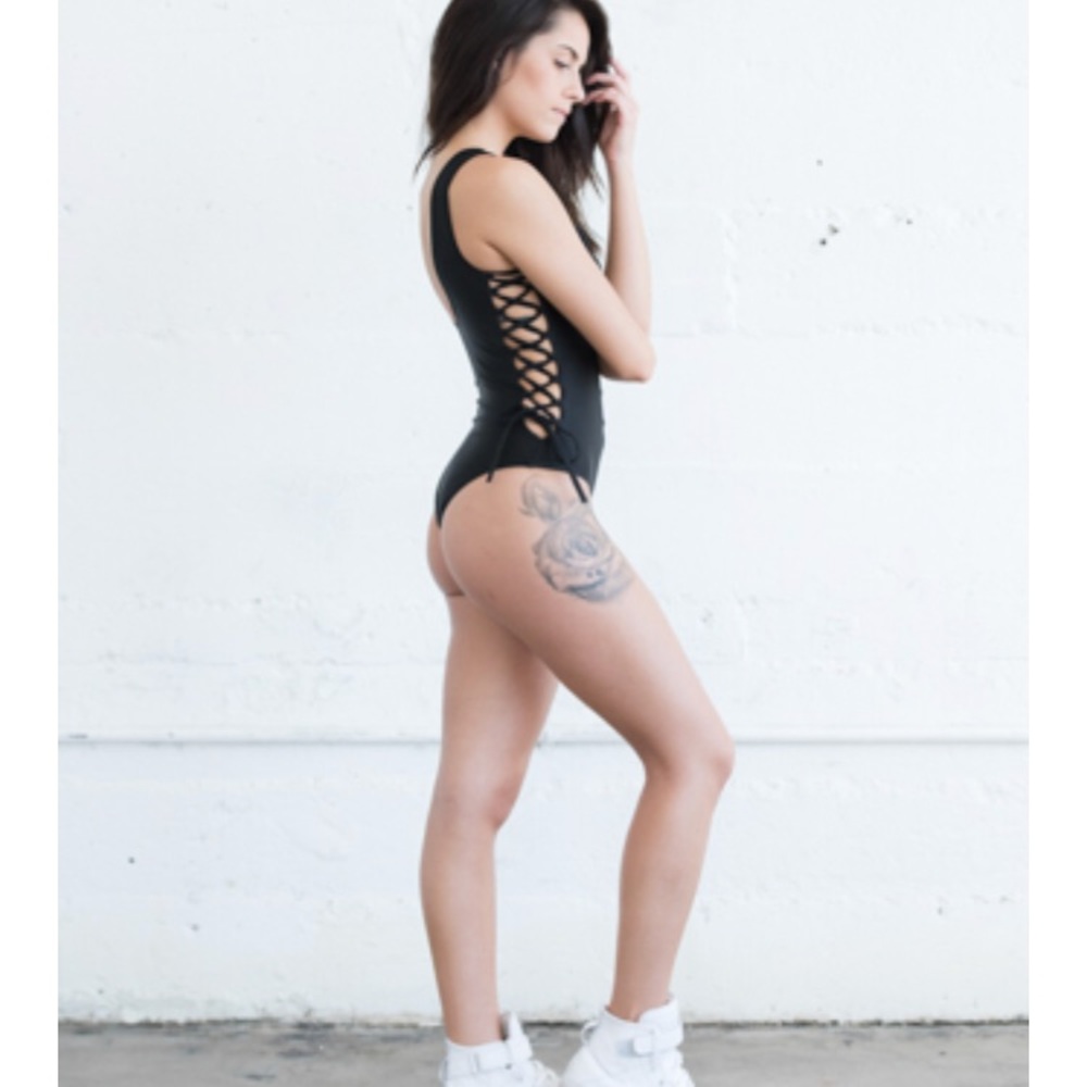 Super sexy lace up one piece.